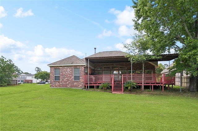 314 Spartan Loop, Slidell, LA 70458 - rear view of house with a lawn, brick siding, and a deck