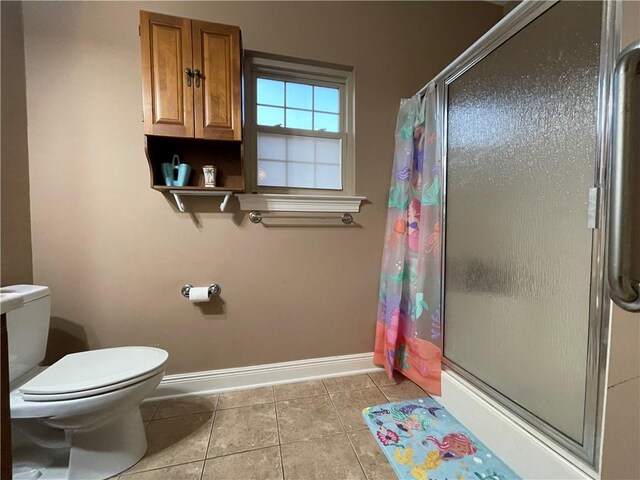 2986 Palm Dr, Slidell, LA 70458 - bathroom with a shower stall and tile patterned flooring