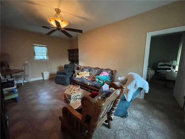 2986 Palm Dr, Slidell, LA 70458 - living room with ceiling fan and tile patterned floors