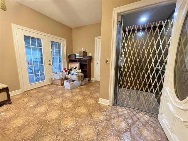 2986 Palm Dr, Slidell, LA 70458 - entrance foyer with baseboards and french doors