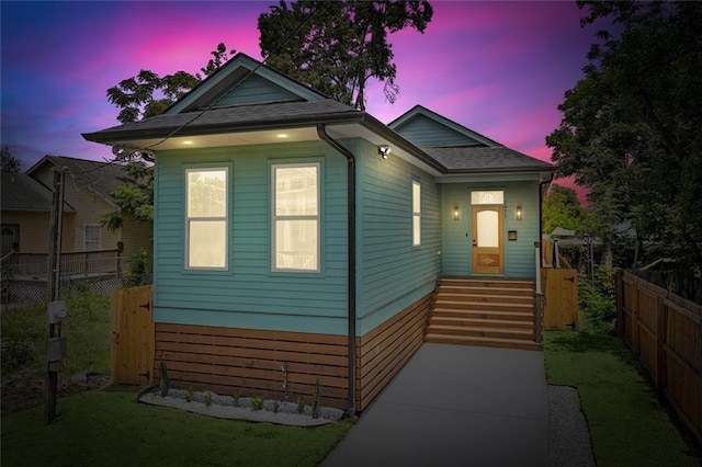 1871 N Roman St, New Orleans, LA 70116 - view of front of home featuring a shingled roof