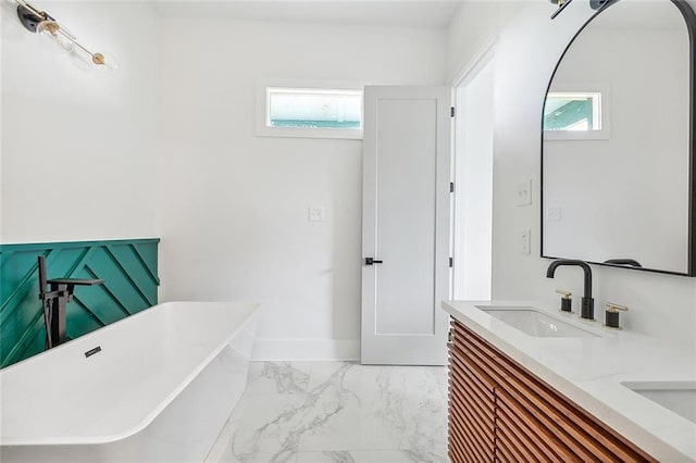 1871 N Roman St, New Orleans, LA 70116 - bathroom with a soaking tub, double vanity, and marble look tile flooring