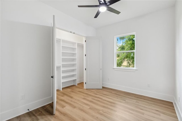 1871 N Roman St, New Orleans, LA 70116 - unfurnished bedroom with light wood finished floors, a ceiling fan, and a closet