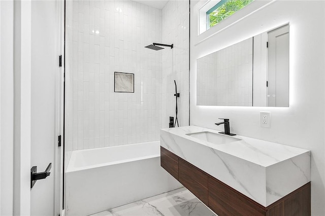 1871 N Roman St, New Orleans, LA 70116 - full bath with vanity, marble look tile flooring, and tub / shower combination