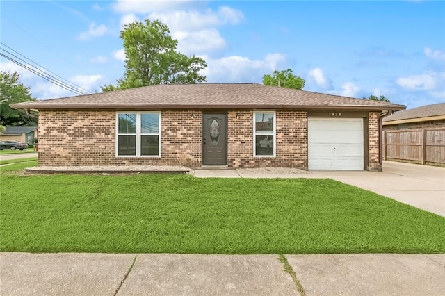 1828 San Francisco Rd, La Place, LA 70068 - ranch-style house featuring brick siding, driveway, a garage, and roof with shingles