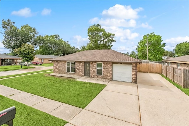 1828 San Francisco Rd, La Place, LA 70068 - ranch-style house featuring driveway, brick siding, a garage, and roof with shingles
