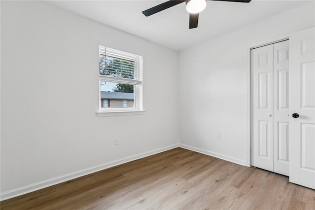1828 San Francisco Rd, La Place, LA 70068 - unfurnished bedroom featuring light wood-style floors, a closet, and a ceiling fan
