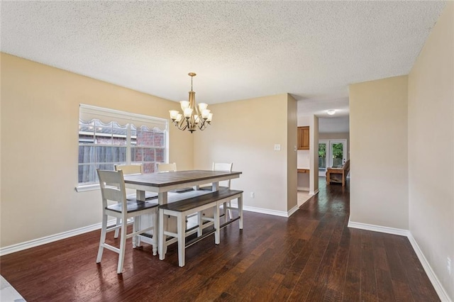 416 Spartan Loop, Slidell, LA 70458 - dining space with hardwood / wood-style flooring, a chandelier, and a textured ceiling