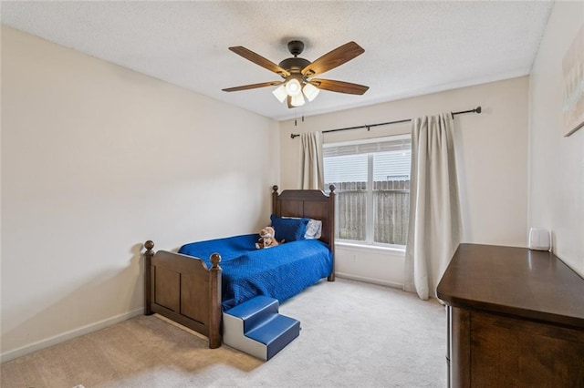 416 Spartan Loop, Slidell, LA 70458 - bedroom featuring carpet flooring, ceiling fan, and a textured ceiling