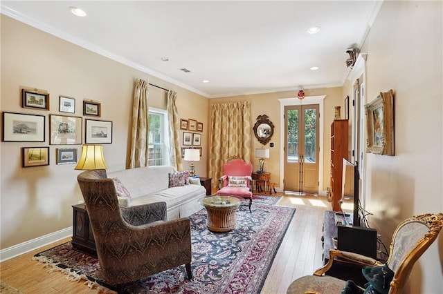 626 Independence St, New Orleans, LA 70117 - living area featuring hardwood / wood-style floors, crown molding, and recessed lighting