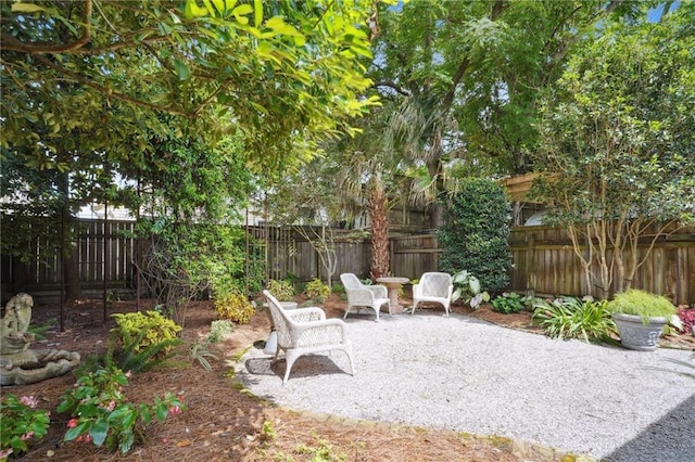 626 Independence St, New Orleans, LA 70117 - fenced backyard with a patio area