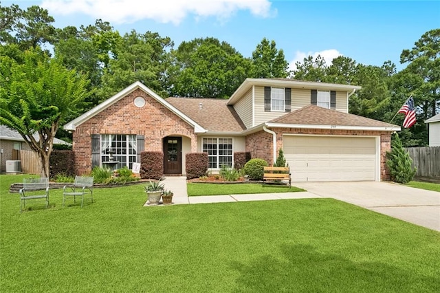 240 Emerald Crk W, Abita Springs, LA 70420 - traditional-style home with brick siding, an attached garage, driveway, and a shingled roof