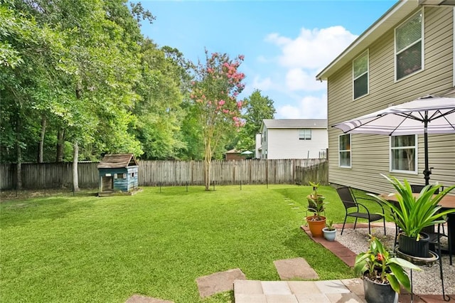240 Emerald Crk W, Abita Springs, LA 70420 - fenced backyard featuring a shed