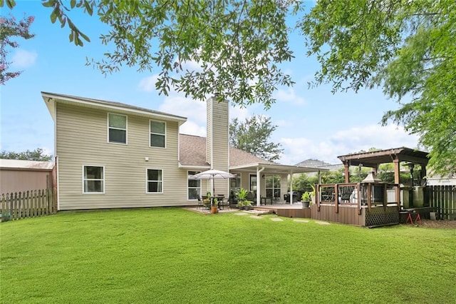 240 Emerald Crk W, Abita Springs, LA 70420 - rear view of property featuring a gazebo, a fenced backyard, a chimney, and a patio