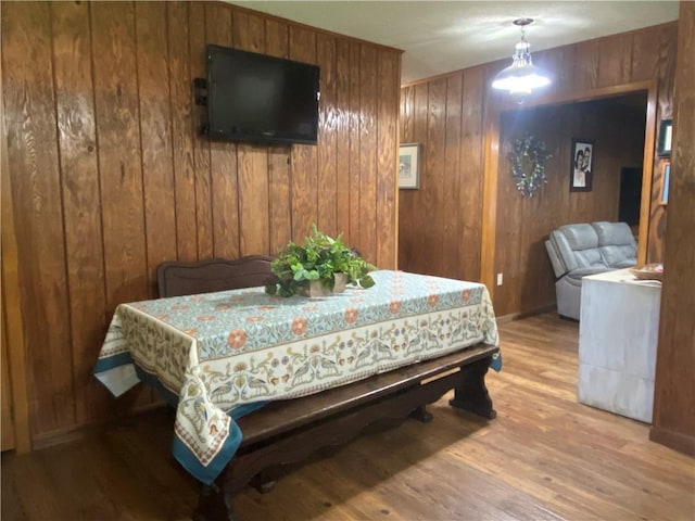 74258 N River Rd, Kentwood, LA 70444 - bedroom featuring wood walls and wood finished floors
