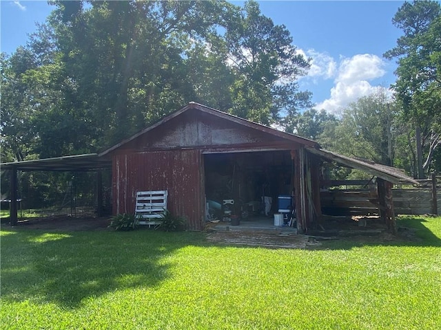 74258 N River Rd, Kentwood, LA 70444 - view of pole building featuring a yard
