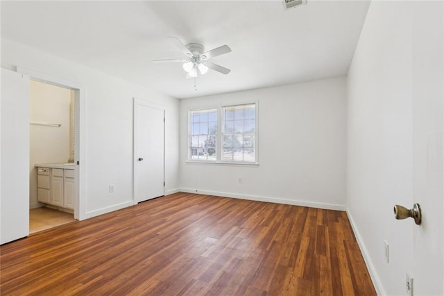 6501 Lafreniere St, Metairie, LA 70003 - unfurnished bedroom featuring wood finished floors, connected bathroom, and ceiling fan