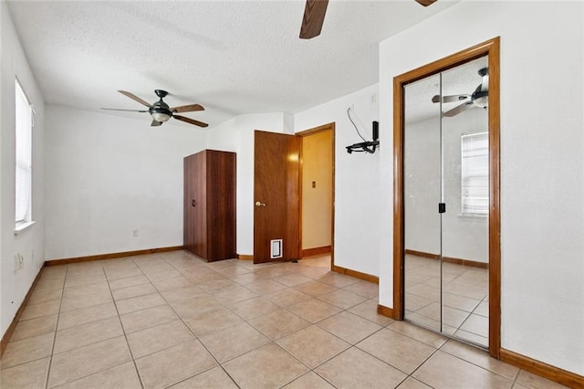 41 Camellia Ln, Waggaman, LA 70094 - unfurnished room with a ceiling fan, a textured ceiling, and light tile patterned flooring