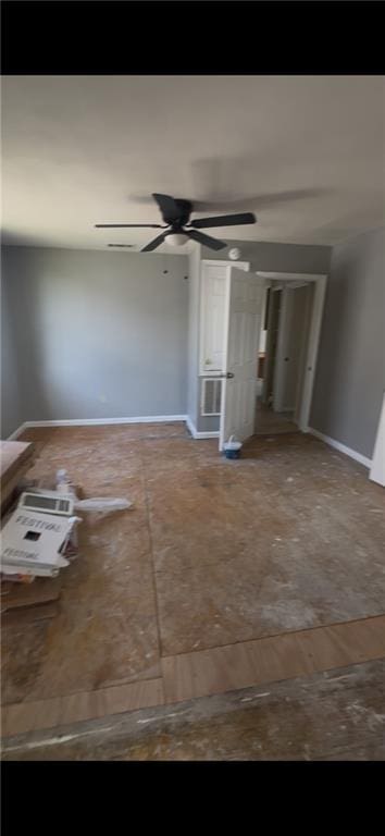 2006 Clouet St, New Orleans, LA 70117 - empty room featuring baseboards and a ceiling fan