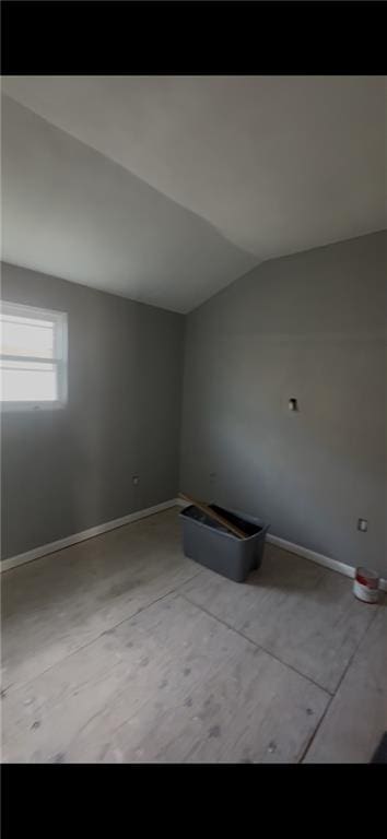 2006 Clouet St, New Orleans, LA 70117 - unfurnished room with vaulted ceiling and baseboards