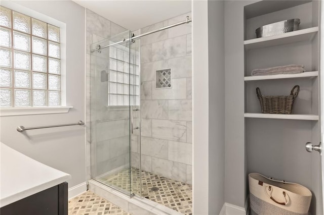 6910 General Diaz St, New Orleans, LA 70124 - bathroom with a shower stall, vanity, and healthy amount of natural light