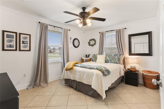 6910 General Diaz St, New Orleans, LA 70124 - bedroom featuring multiple windows, light tile patterned floors, ceiling fan, and ornamental molding