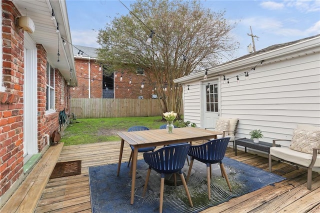 6910 General Diaz St, New Orleans, LA 70124 - deck featuring a fenced backyard and outdoor dining area