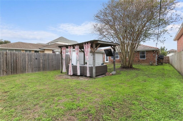 6910 General Diaz St, New Orleans, LA 70124 - fenced backyard featuring an outbuilding