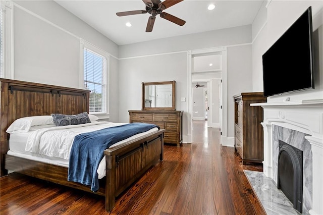 4532-34 Chestnut St, New Orleans, LA 70115 - bedroom featuring a fireplace, wood finished floors, recessed lighting, and ceiling fan