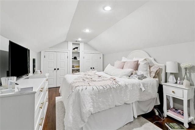 4532-34 Chestnut St, New Orleans, LA 70115 - bedroom with lofted ceiling, dark wood finished floors, two closets, and recessed lighting
