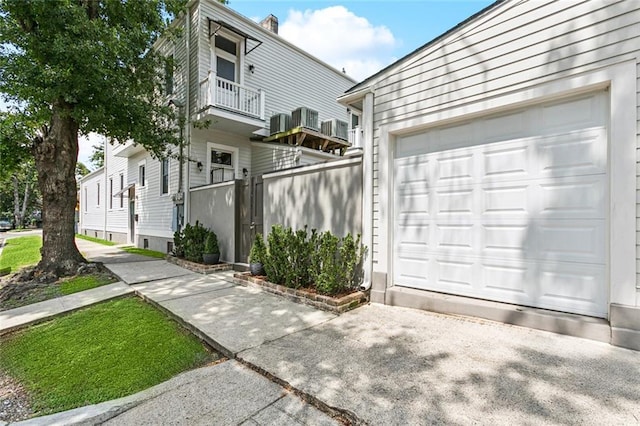 4532-34 Chestnut St, New Orleans, LA 70115 - view of front of home with a balcony and concrete driveway