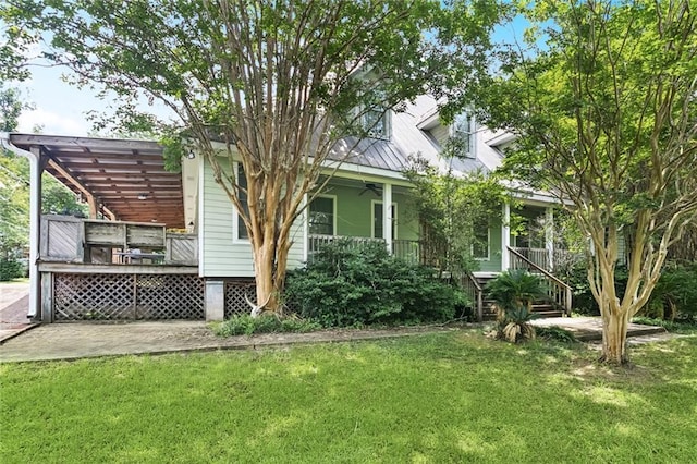 19632 Carol Morgan Rd, Franklinton, LA 70438 - back of property featuring a lawn, covered porch, ceiling fan, stairs, and a pergola