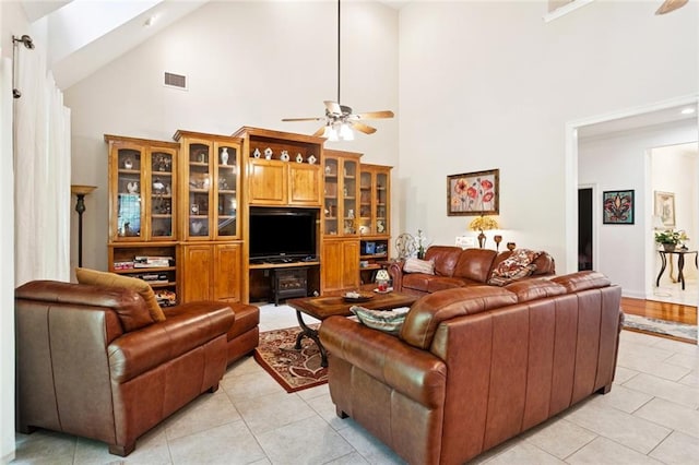 19632 Carol Morgan Rd, Franklinton, LA 70438 - living area with ceiling fan, high vaulted ceiling, and light tile patterned floors
