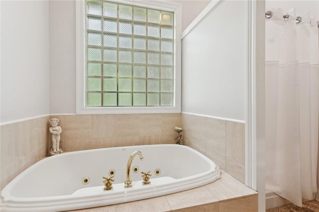 19632 Carol Morgan Rd, Franklinton, LA 70438 - bathroom featuring plenty of natural light, a whirlpool tub, and curtained shower