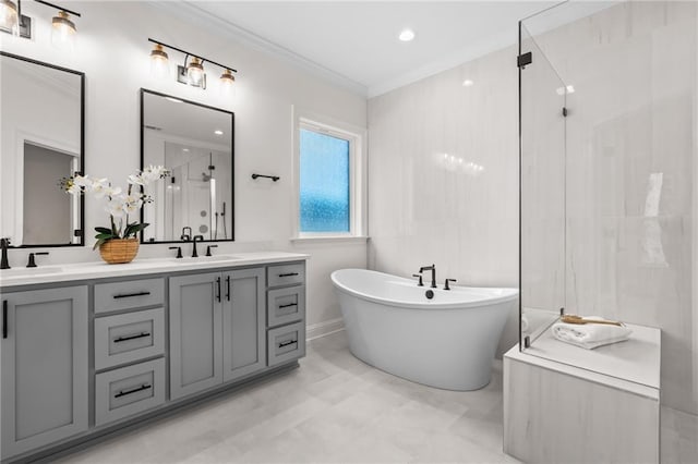 1169 Fox Sparrow Loop, Madisonville, LA 70447 - bathroom with a stall shower, double vanity, crown molding, and a freestanding tub