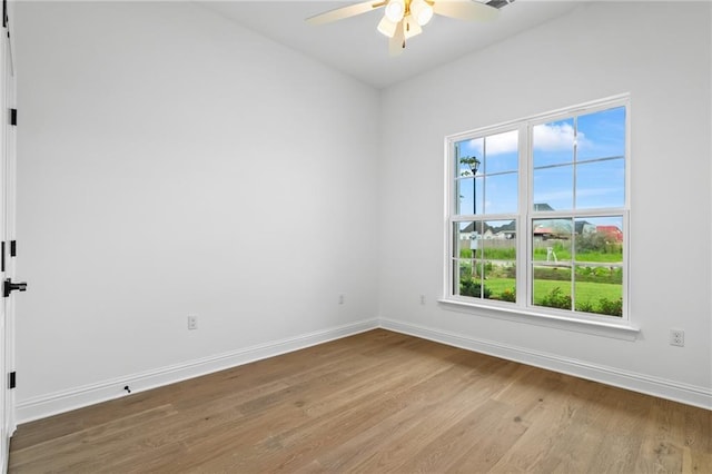 1169 Fox Sparrow Loop, Madisonville, LA 70447 - spare room with ceiling fan, wood finished floors, and healthy amount of natural light