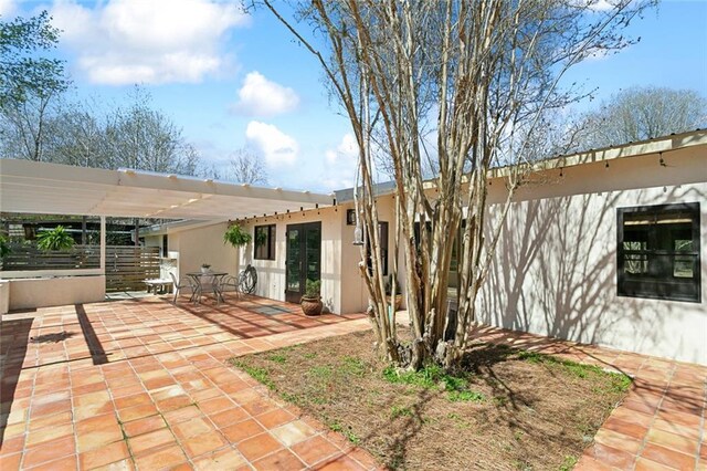 80695 Bob Baxter Rd, Bush, LA 70431 - back of property featuring stucco siding and a patio area