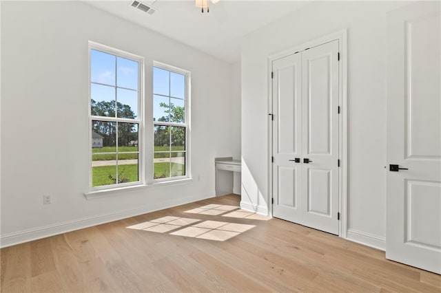 4141 Endor Loop, Mandeville, LA 70448 - unfurnished bedroom with light wood finished floors and baseboards
