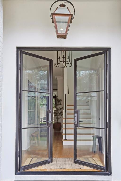 303 W William David Pkwy, Metairie, LA 70005 - doorway to outside with wood finished floors