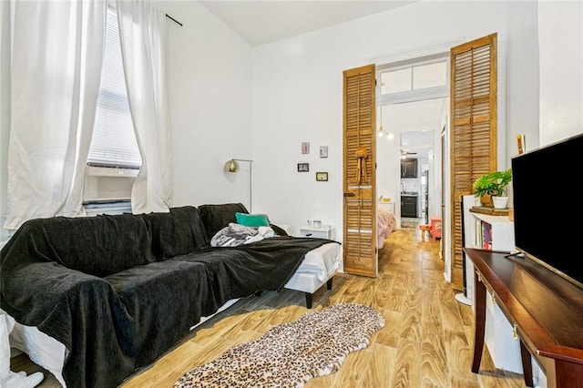 112830 N Roman St, New Orleans, LA 70116 - bedroom featuring light wood-type flooring and cooling unit