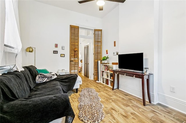 112830 N Roman St, New Orleans, LA 70116 - living area with a ceiling fan and light wood-type flooring