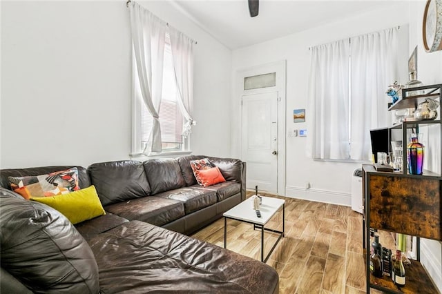 112830 N Roman St, New Orleans, LA 70116 - living area featuring light wood-type flooring and baseboards