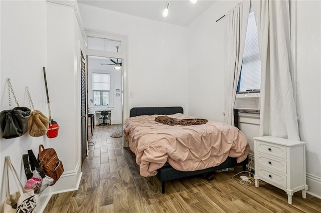 112830 N Roman St, New Orleans, LA 70116 - bedroom featuring wood finished floors