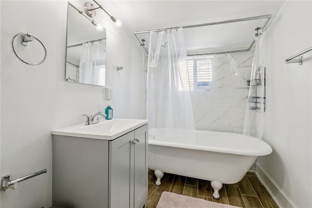 112830 N Roman St, New Orleans, LA 70116 - full bath with vanity, wood finish floors, and shower / bathtub combination with curtain