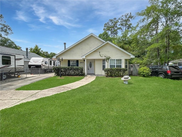 2411 Jay St, Slidell, LA 70460 - view of front of property featuring driveway and a gate