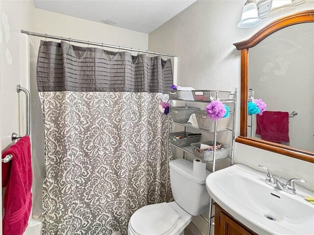 2411 Jay St, Slidell, LA 70460 - bathroom featuring vanity and toilet
