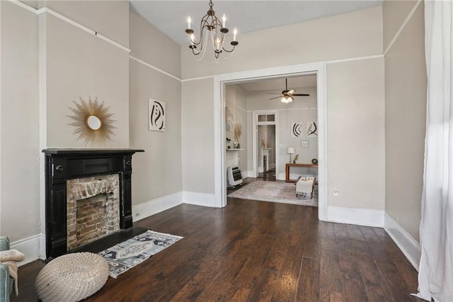 820-22 N Salcedo St, New Orleans, LA 70119 - interior space with a stone fireplace, wood finished floors, a chandelier, and ceiling fan