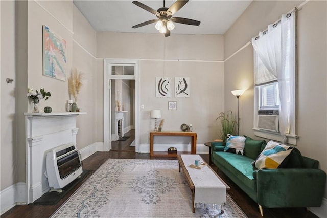 820-22 N Salcedo St, New Orleans, LA 70119 - living room featuring heating unit, a glass covered fireplace, ceiling fan, wood finished floors, and cooling unit