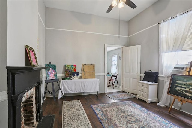 820-22 N Salcedo St, New Orleans, LA 70119 - bedroom with hardwood / wood-style flooring, a fireplace, a ceiling fan, and cooling unit
