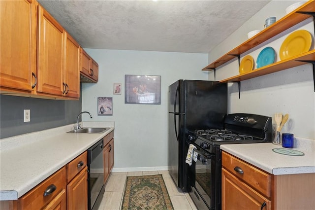 820-22 N Salcedo St, New Orleans, LA 70119 - kitchen featuring black appliances, open shelves, light countertops, brown cabinets, and a textured ceiling